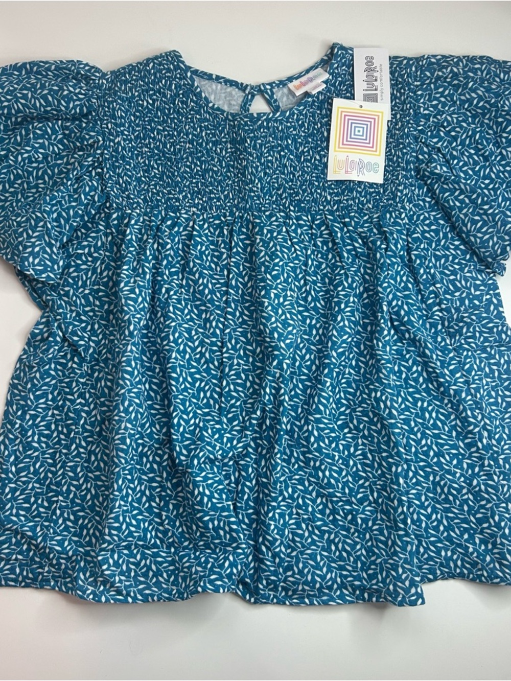 LuLaRoe Teal Leaf Print Smocked Peplum Top Flutter Sleeve Fairy Whimsy Medium